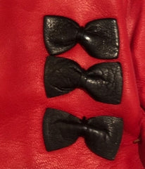 LIMITED EDITION, PERFORATED WOMEN FIRE ENGINE  RED LEATHER GLOVES WITH BOWS, SILK LINER, MADE IN ITALY - DETAILS